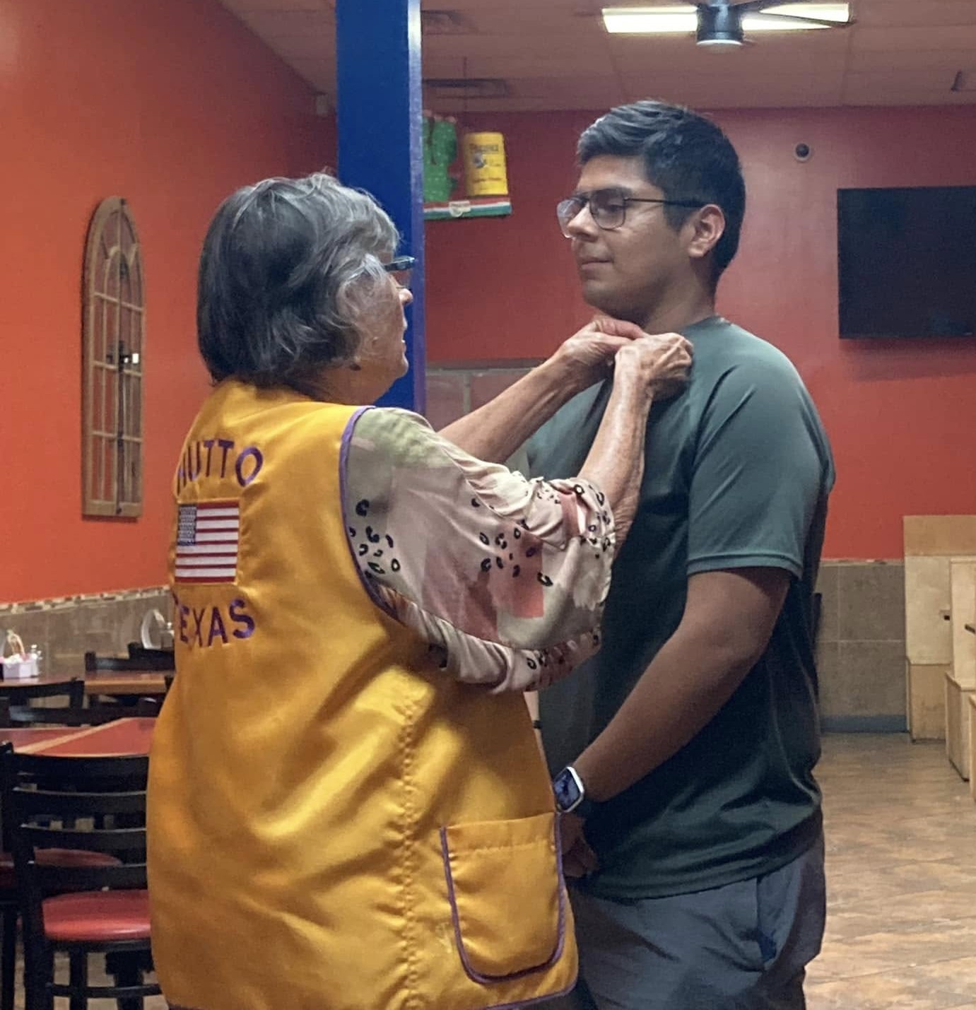 Man gets pinned as new member during ceremony